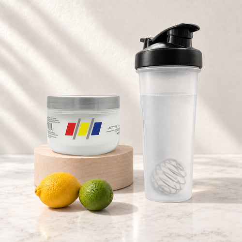 Active Essentials Classic Yellow electrolyte jar beside an unbranded shaker bottle with lemon and lime
